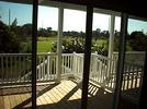 View from the porch of a typical key west golf club home, overlooking the key west golf course
